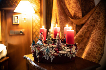 Christmas table composition. Beautiful decoration. Christmas trees, candles, stars, lights and elegant accessories. Merry Christmas and Happy Holidays, Template.