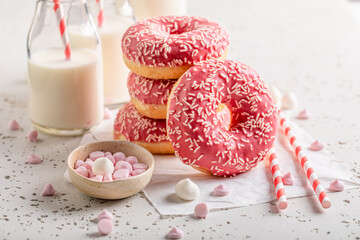 Sweet pink donuts ready to eat. Best tastes with milk.