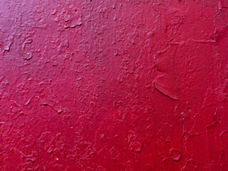 Abstract background of time-damaged paint on wall.
