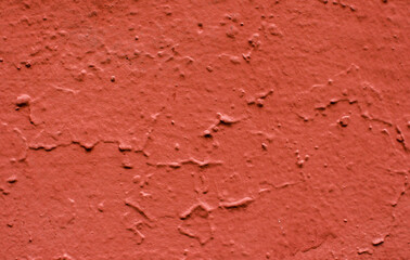 Background from old red paint on the surface