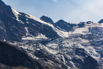 Glacier in the mountains of North Ossetia. Sharp peaks of the North Caucasus mountains.