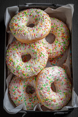 Sweet and yummy white donuts freshly baked