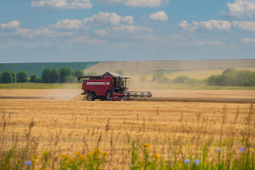 Obraz premium heavy agricultural machinery for harvesting