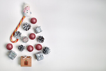 Christmas decorations in the shape of a Christmas tree on a white background