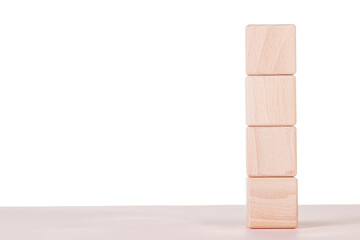 Four wooden cubes on a white background