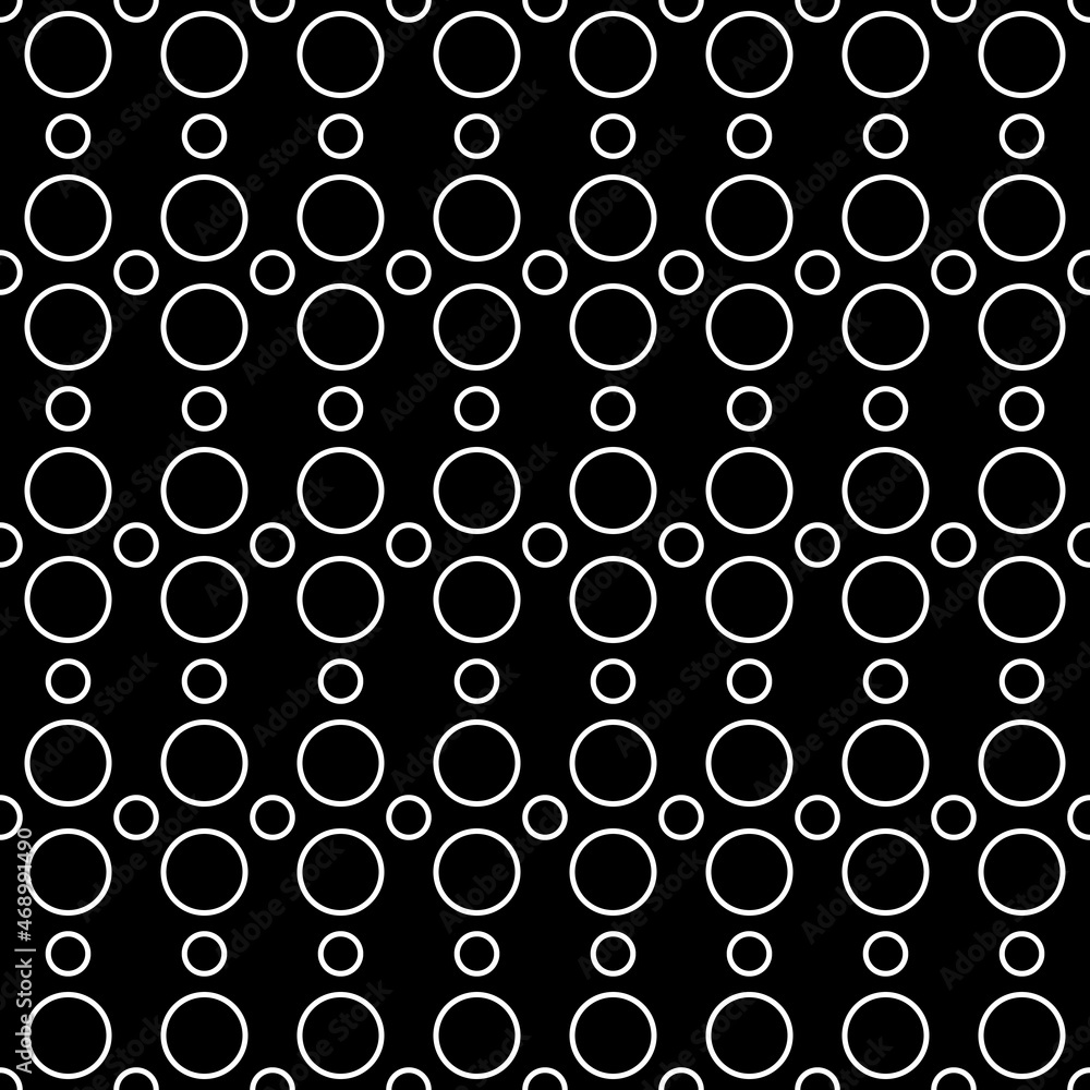 Aufkleber rings of white color that are repeated and a black background. vector seamless pattern with rings.