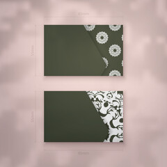Dark green business card with Greek white pattern for your personality.