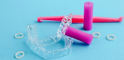 Transparent invisible dental aligners or braces applicable for an orthodontic dental treatment. Banner.	