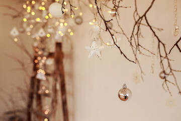 Beautiful Christmas ornaments and decorations, blurred lights in the background. 