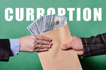 Giving money to a person. Giving bribe. Corruption concept. International corruption day - 9th...