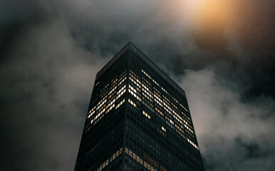 Skyscrapers in the city at night manhattan new york real estate urban exploration financial office district tower with lights on