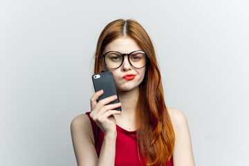 pretty woman with glasses talking on the phone technology lifestyle