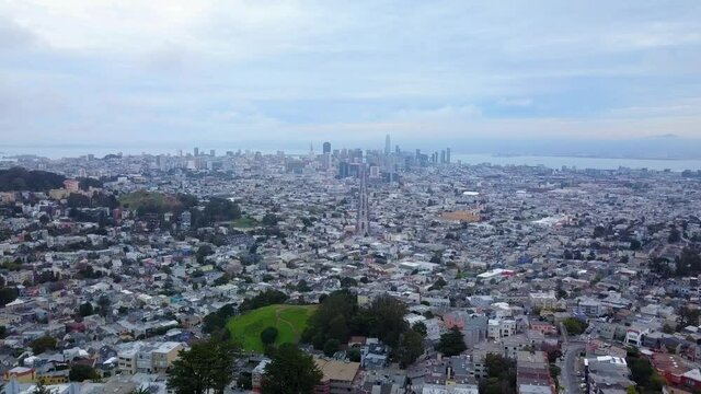 Aerial flying backwards away from the beautiful San Francisco city skyline.