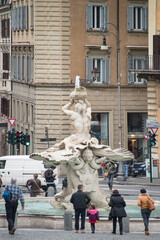 Piazza Barberini on the Quirinal Hill with its Triton Fountain (1643) sculpted by Bernini. The square was created in the 16th century. Rome, Italy, Feb 2015