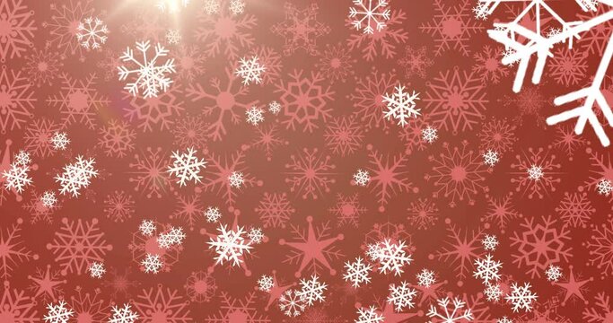 Animation of snow falling on red background at christmas