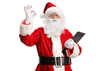 Santa Claus holding a clipboard and gesturing ok sign