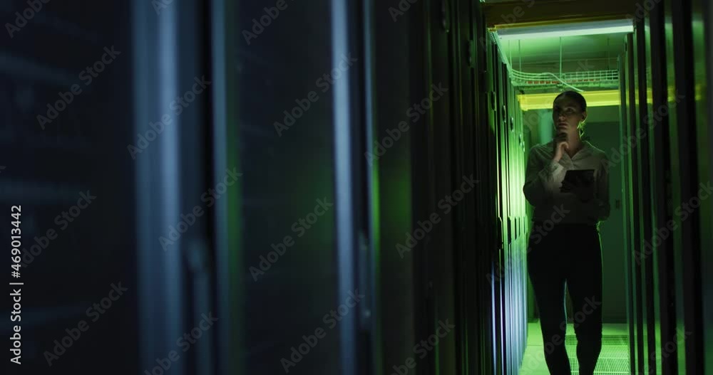 Poster caucasian female it technician using tablet checking computer server
