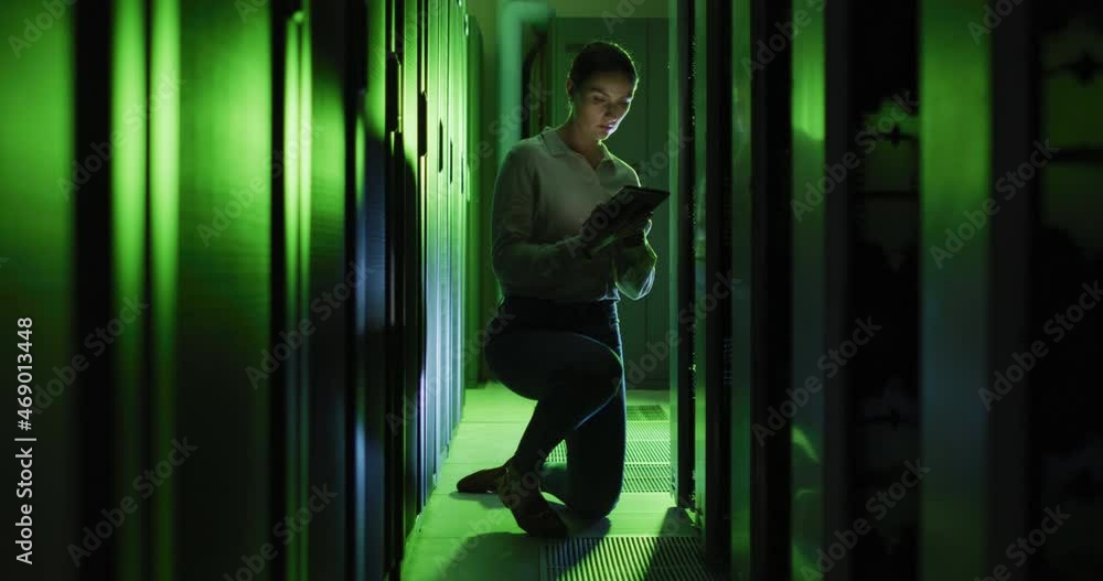 Poster caucasian female it technician using tablet checking computer server