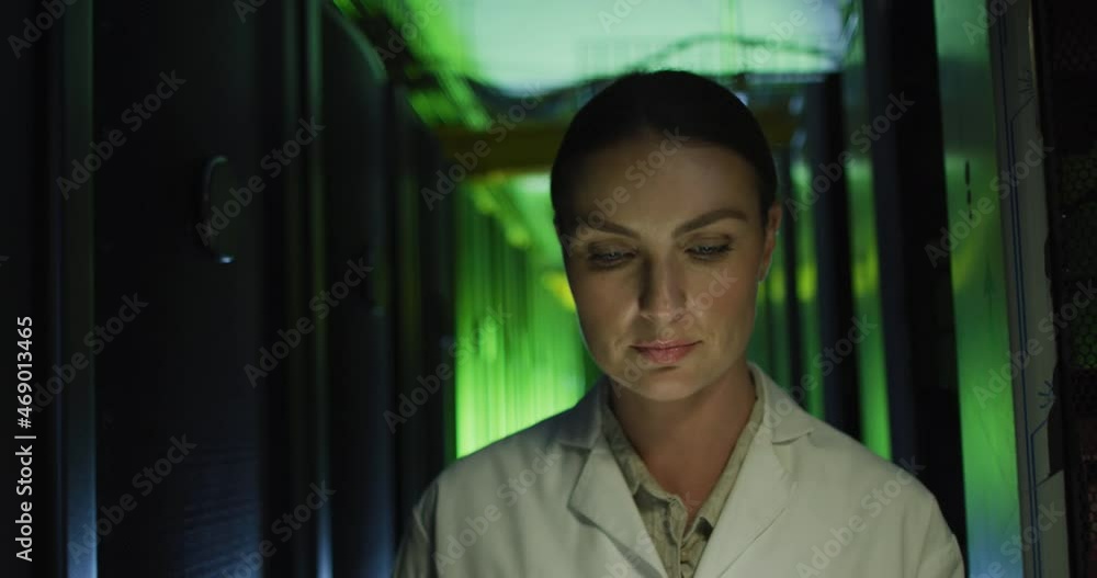Aufkleber caucasian female it technician in lab coat using tablet checking computer server
