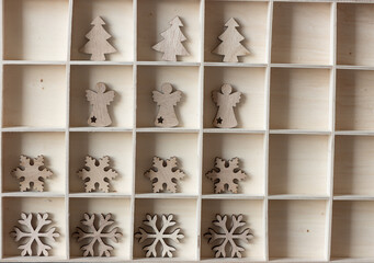 decorative wooden box with wooden christmas themed shapes