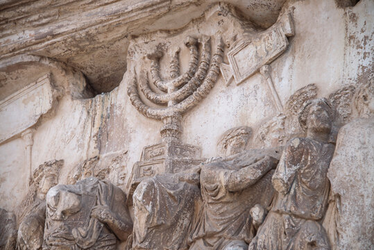The panel depicts the spoils taken from the Temple in Jerusalem in the Arch of Titus, as The Golden Menorah carved in deep relief. This is unique Biblical Menorah model made by Moses. Rome, Italy.