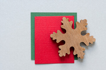 christmas themed background - isolated large wooden snowflake