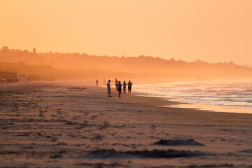 Telephoto beach landscape at sunrise