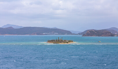 Obraz premium tropical islands surrounded by coral aqua coloured waters and white sands is located in close proximity to Noumea, the capital city.