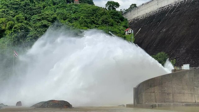 Closeup water at Khun Dan Prakan Chon Dam is a large concrete dam that is releasing water in the rainy season. Address in Nakhon Nayok Province, Thailand. 