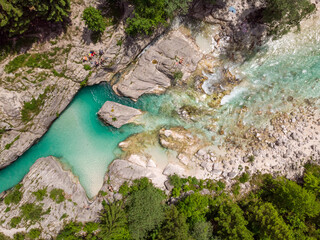 Fototapeta na wymiar Aerial drone view of magical turquoise color of Soca river, Slovenia