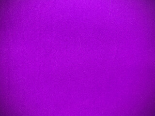 Purple velvet fabric texture used as background. Empty purple fabric background of soft and smooth textile material. There is space for text.