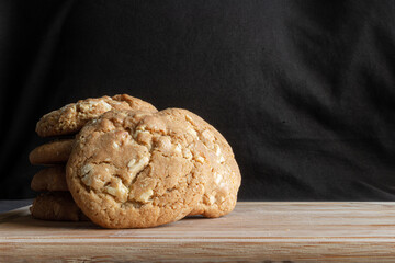 White chocolate cookies on a wooden table