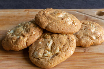 White chocolate cookies on a wooden table