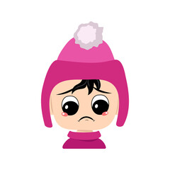 Baby with sad emotions, depressed face, down eyes in pink hat with pom pom. Kid with melancholy expression in headdress