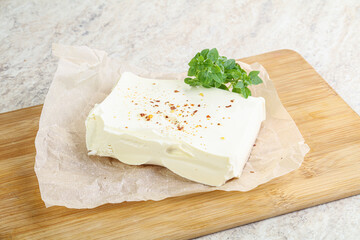 Greek Feta cheese over board