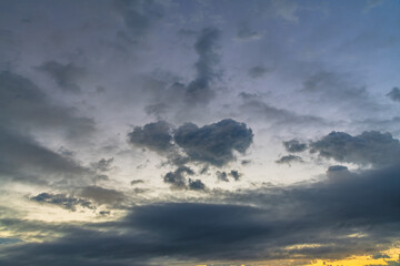 Naklejka na ściany i meble Sunrise waterscape with cloud covered sky