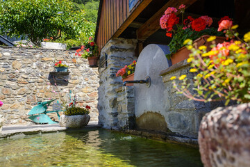 Fountain of Graihen village close to Saint Lary Soulan, France