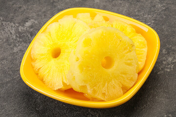 Sweet pineapple rings in the bowl