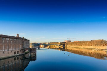 Toulouse city and Garonne river during a sunny day