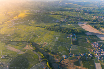 Sunset colors over vineyards and landscape of Beaujolais land