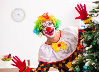 Funny clown in Christmas celebration concept