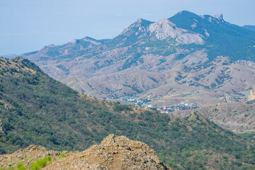Fototapeta na wymiar View from the volcano Kara Dag to the mountains in Crimea