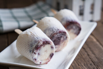 coconut with mungo ice drop; a very common dessert in the Philippines by using condensed milk,...