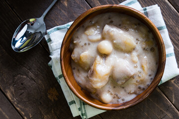 ginataan or mixture of banana, taro, pumpkin, rice balls and sago in coconut milk