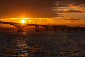 Bridge at sunrise. Beautiful sunrise or sunset scenery view on river bridge silhouette