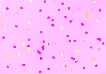 pink confetti candy on pastel pink background