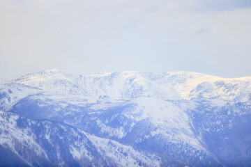Fototapeta na wymiar mountains snowy peaks, abstract landscape winter view
