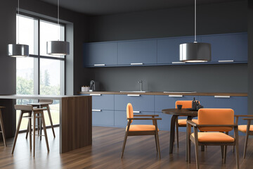 Blue and orange kitchen with steel details. Corner view.