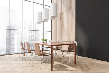 Corner view on bright dining room interior with panoramic window