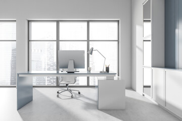Fototapeta na wymiar Bright office interior with desktop, panoramic window with Singapore view